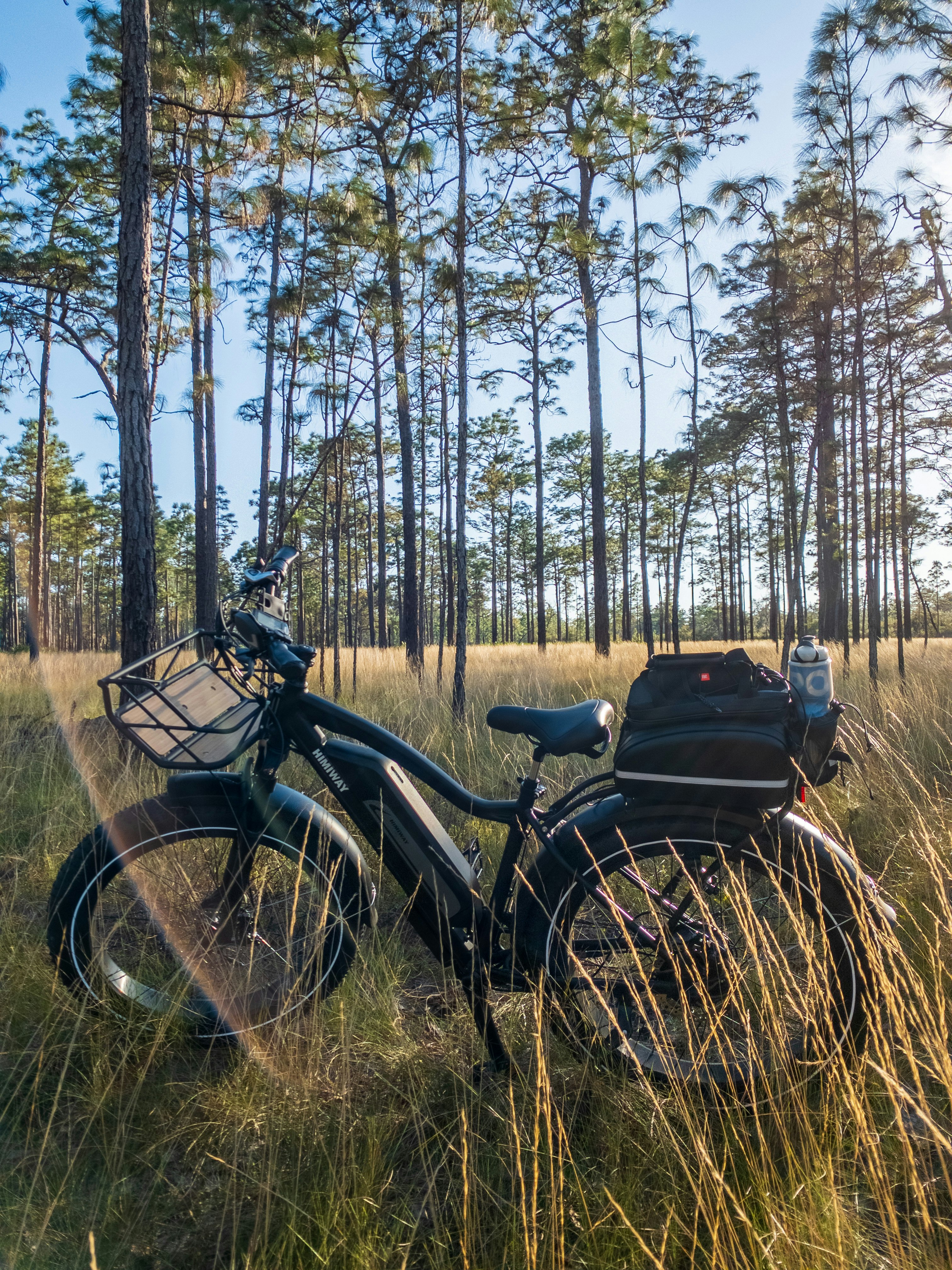 black and brown motorcycle on brown grass field during daytime